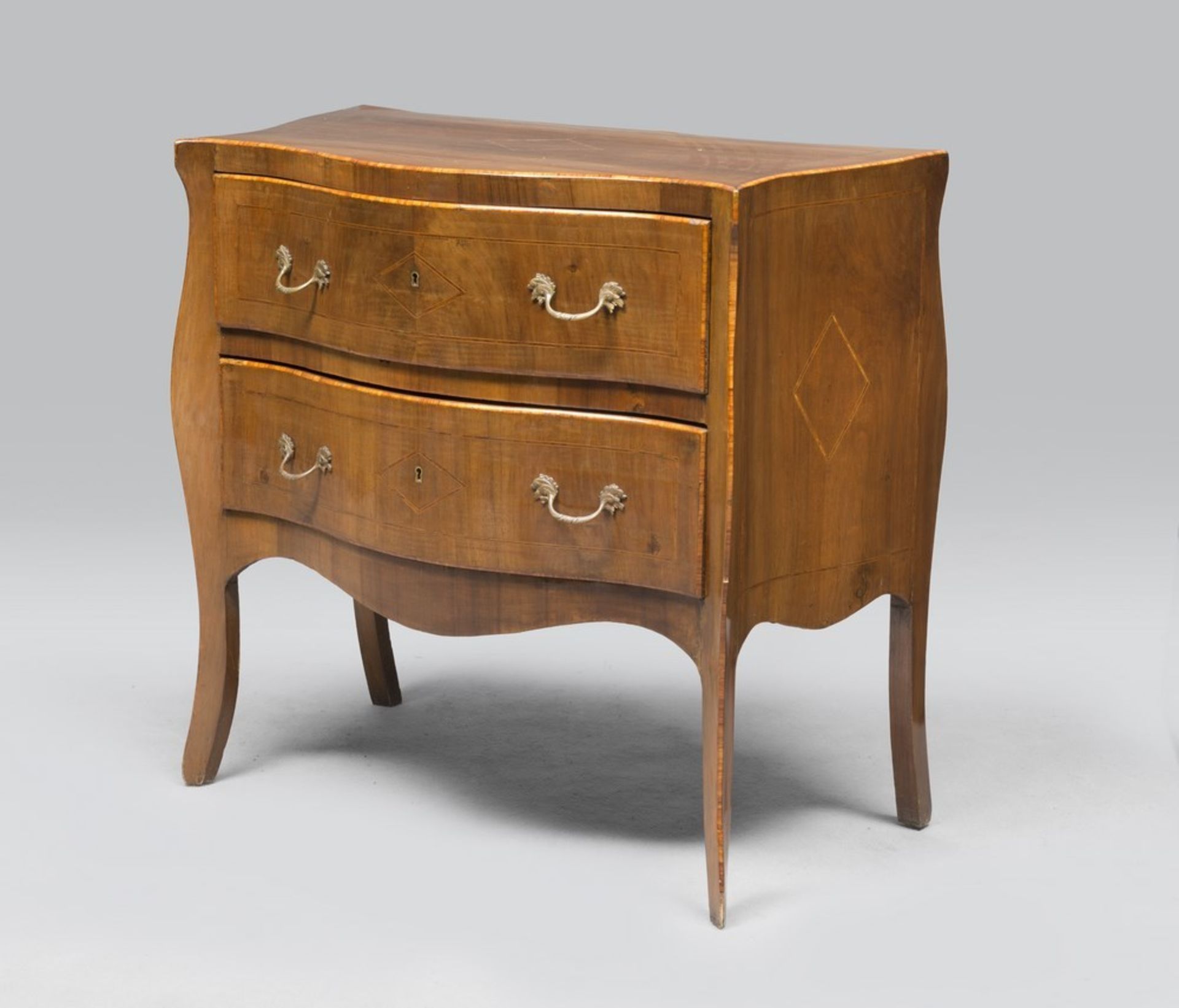 Small walnut dresser, Naples late 19th century Eighteenth-century style, with threads and edges in