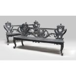 PAIR OF EBONY BENCHES, EMILIA OR FRANCE 19TH CENTURY with perforated back panels and carved by