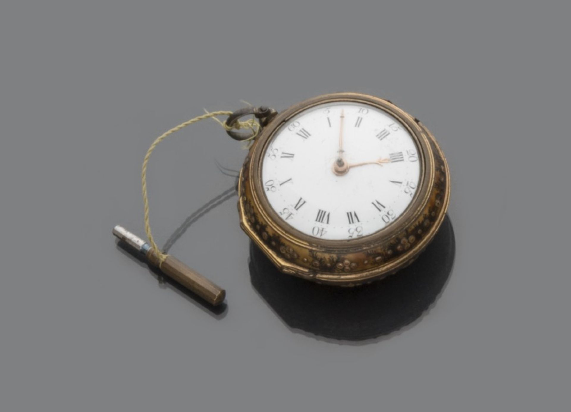 RARE SMALL POCKETWATCH with quadrant to white enamel with Roman numbers. Back of the decorated box