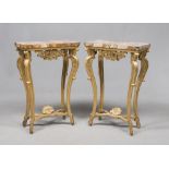 Pair of small giltwood consoles, Rome 18th century With African marble tops. Front and sides with