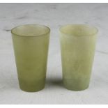 A pair of jade small glasses. 20th century. Measures cm. 7,5 x 4,7. COPPIA DI BICCHIERINI IN