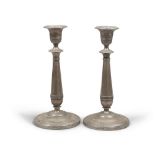 Pair of silver candlesticks, Venetia 1812/1872 With a smooth body, with palmettes decorations at the