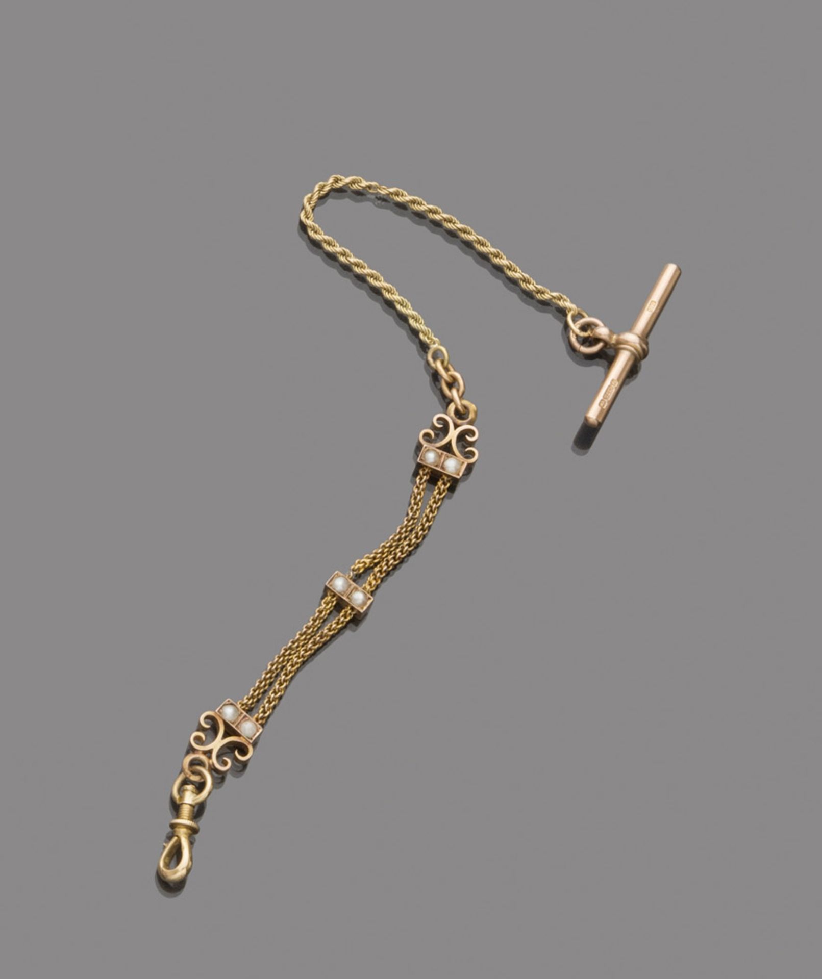 POCKET WATCH CHAIN In yellow gold 9 kt., with six small pearls. Length cm. 22, weight gr. 10,00.