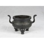 A Chinese burnished patina bronze censer. 19th century. Measures cm. 11,5 x 20 x 12,7. INCENSIERE IN