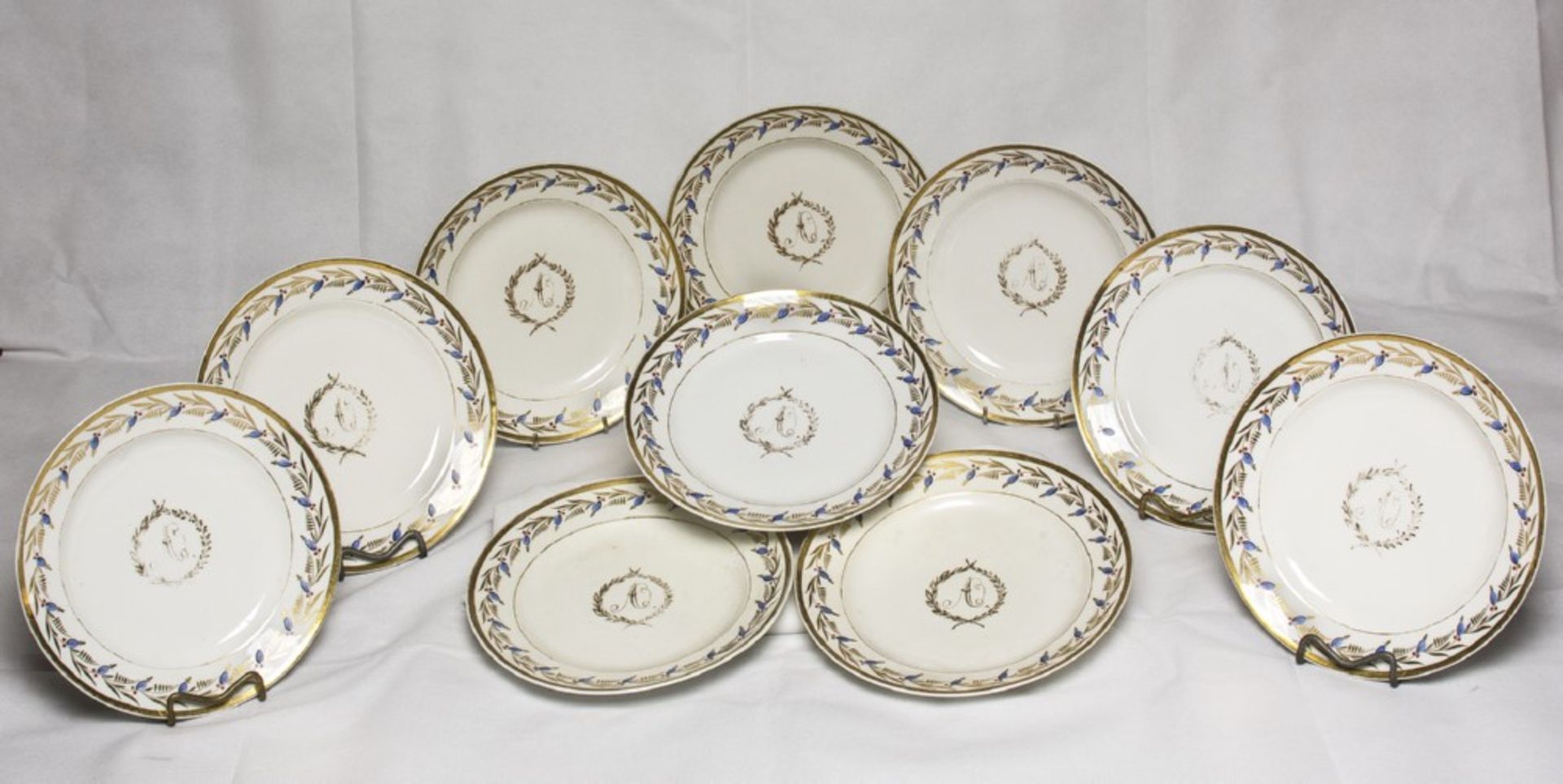 TEN PORCELAIN DISHES, PROBABLY FRANCE 19TH CENTURY in white enamel, centered in the initial ' A '