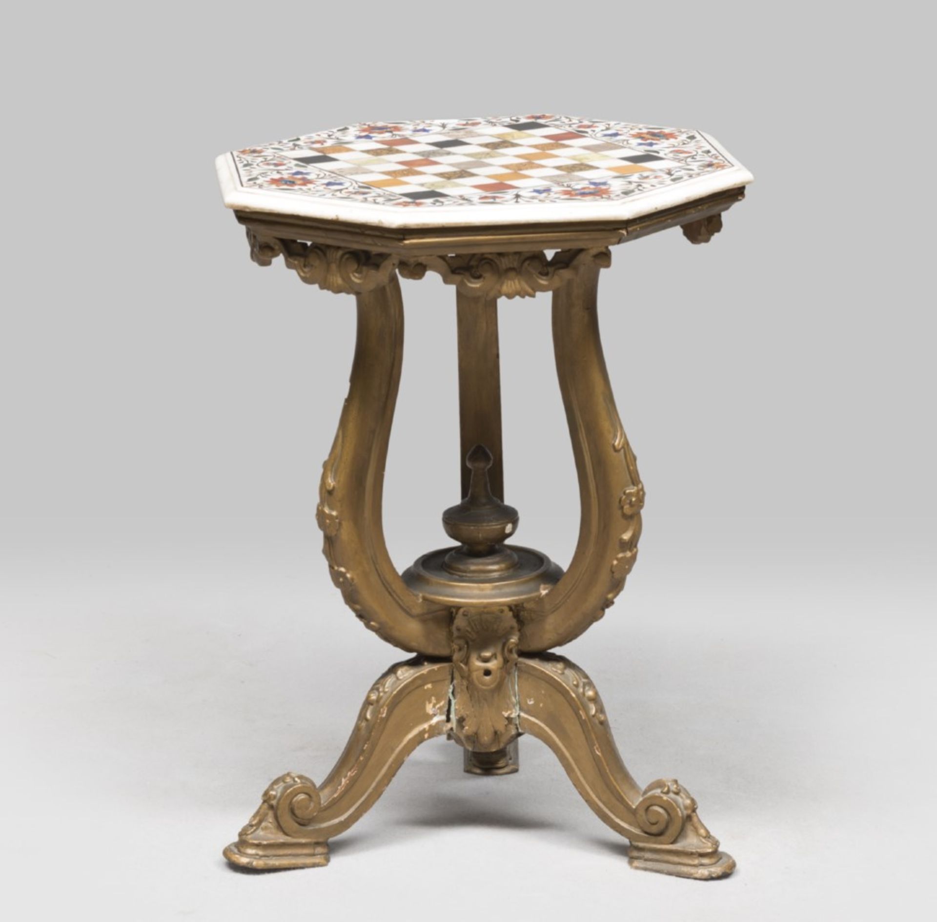 GILTWOOD TABLE, ROME 19TH CENTURY with octagonal top in uncrusted marbles on the Board. Legs and