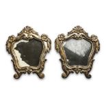 Pair of Silvered wood appliques, 18th century Carved with leaves, flowers and curls. mirrors.