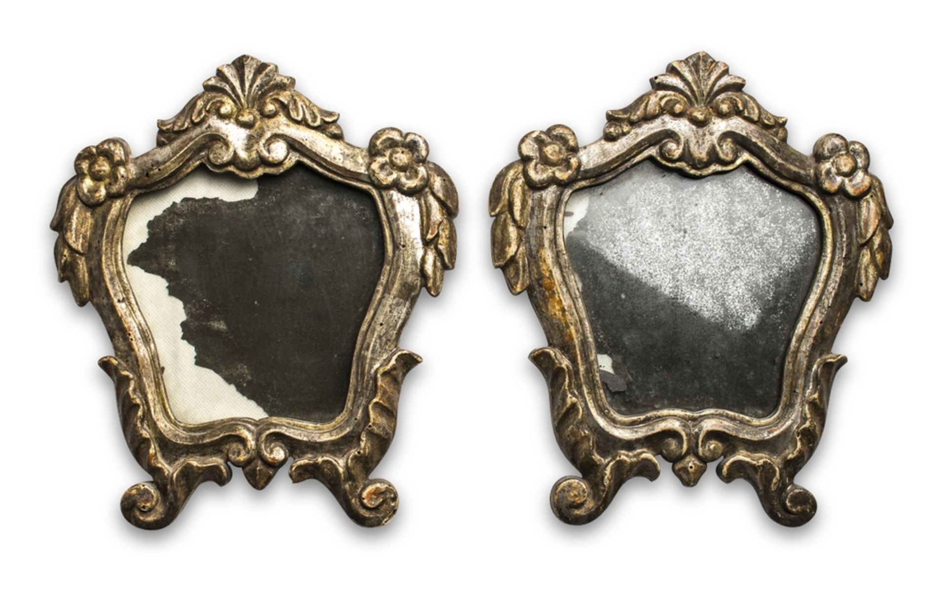 Pair of Silvered wood appliques, 18th century Carved with leaves, flowers and curls. mirrors.