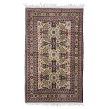 RUG KAZAK, MID 20TH CENTURY with lozenges and flowers and secondary reasons in symbolism, in the