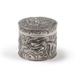 SMALL BOX IN SILVER, PROBABLY CHINA, XX CENTURY with a circular shape, entirely embossed with