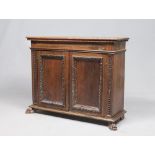 Rare Walnut sideboard, central Italy, late 16th century With rectangular top on a pod and front with