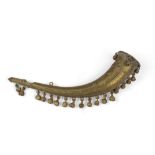 A Tibetan ritual bronze cornet. Early 20th century. Measures cm. 12 x 32 x 6. TROMBA RITUALE A CORNO