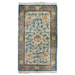 A Chinese carpet of Tien-Tsin. Half 20th century. Measures cm. 210 x 125. TAPPETO CINESE, TIEN-