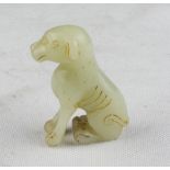 A Chinese jade sculpture dipcting dog. 20th century. Measures cm. 7 x 2 x 4. SCULTURA IN GIADA, CINA