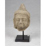 A Kmer carved sandstone Buddha's head. Cambodia, 12th - 13th century. h. cm. 23 x 15 x 15. TESTA