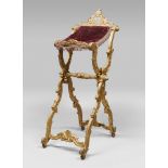 GILTWOOD LECTERN, PROBABLY ROME, 18TH CENTURY with vertical volute-carved acanthus leaves and curls.