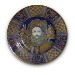 MAJOLICA DISH, SANTARELLI GUALDO TADINO, MIDE 20TH CENTURY in polychrome, with portrait decoration