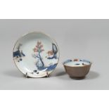 A Chinese porcelain cup with saucer. 19th century. Measures cup cm. 4,5 x 8, diameter saucer cm. 13.