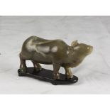 A Chinese jade sculpture, depicting a Buffalo. 19th century. Measures cm. 9 x 19 x 5 SCULTURA IN