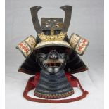 Suji Bachi Kabuto with Mampo, in iron. Japan 20th century. Measures max cm. 48 x 36 x 33. SUJI BACHI