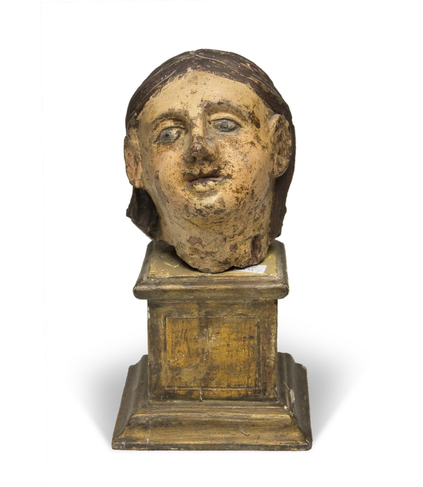 EARTHENWARE HEAD, PROBABLY NAPLES 19TH CENTURY a polychrome paint. Complete with gilded wooden base.
