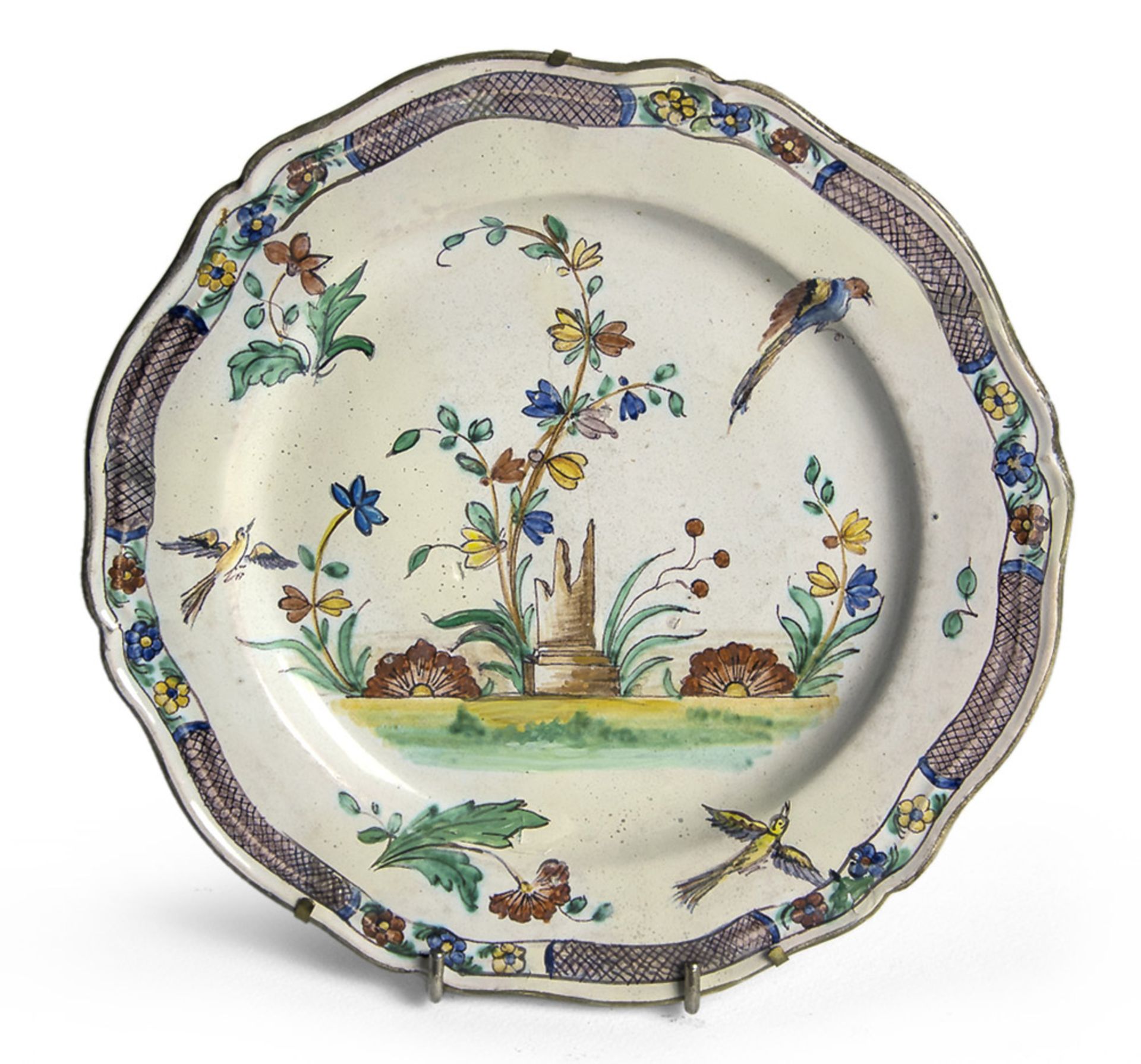 CERAMIC DISH, 19TH CENTURY white enamel and polychrome, with decorative landscaping decor. False