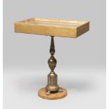 TABLE-SHOWCASE, ANTIQUE ELEMENTS in gilded wood, with leg consists of rostral candlestick. Framed