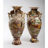 A pair of Japanese ceramic vases. First half 20th century. Measures cm. 61,5 x 30. COPPIA DI VASI IN