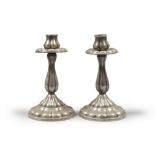 A PAIR OFSILVER CANDLESTICKS, 19TH CENTURY Size cm. 19 x 11, gross weight gr. 360. COPPIA DI