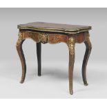 BOULLE GAME-TABLE, FRANCE 19TH CENTURY ebony, entirely clad in golden metal inlays, tortoise with