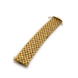 BEL BRACCIALE in 18 kt yellow gold, movable mesh with geometric patterns in smooth gold