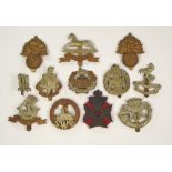 REGIMENTAL CAP BADGES.