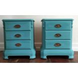 A pair of bedside cabinets