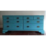 A large chest of drawers,