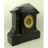 A Victorian slate mantel clock of architectural from,