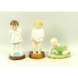 A group of three Royal Worcester figurines comprising 'Tommy', 'Joan' and 'Michael',