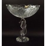 A Waterford crystal centre piece, the base modelled as a seahorse, with oval bowl and circular base,