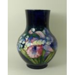 A Moorcroft vase, of ovoid form with cylindrical neck, in the Iris pattern,