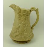 A Victorian stoneware pitcher jug, by Cobridge, cast in relief with a hunting,