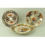 A group of three Royal Crown Derby plates in the Imari colourway, and with gilded highlights,