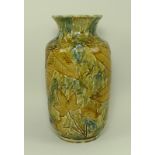 A ceramic vase of ovoid form, with moulded leaf design, in Royal Doulton style,