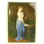 A German painted porcelain plaque of a young woman in Greco-Roman attire holding an amphora,