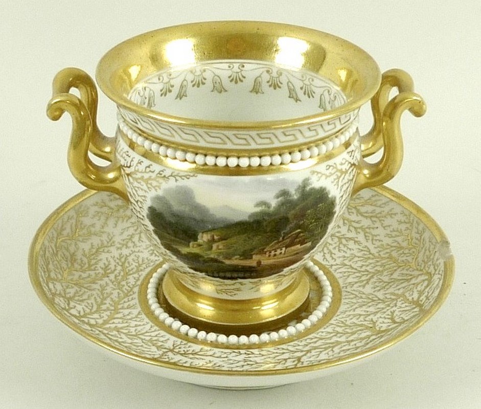 A Flight, Barr & Barr porcelain cup and saucer, circa 1810, of twin handled urn form,