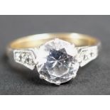 A 9ct gold and white sapphire ring, size 'N', 2.8g total weight.