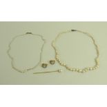 A collection of pearl jewellery, comprising a string of graduated cultured pearls,