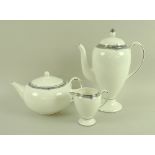 A Wedgwood bone china part dinner, tea and coffee service, decorated in the Amherst pattern,