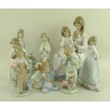 A group of four Lladro figurines, comprising First Sampler, 5767, 30cm, Sweet and Shy, 6754, 23cm,