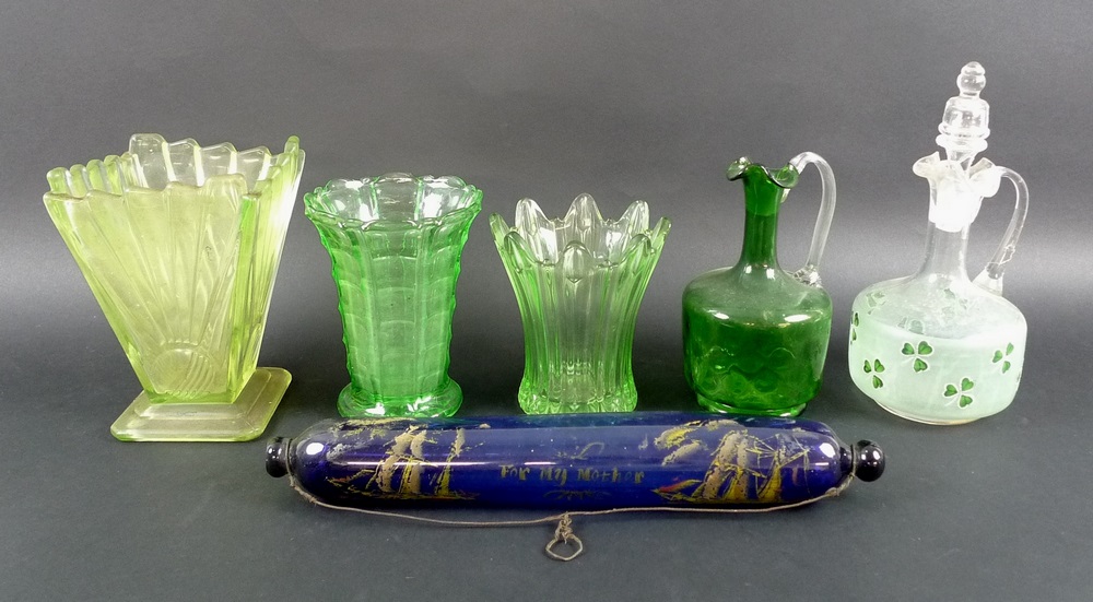 A collection of glass items, including three uranium glass vases, one of splash design,