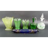 A collection of glass items, including three uranium glass vases, one of splash design,