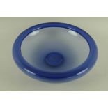 A blue glass bowl, 1960s/70s, by Per Lutken for Holmegaard, signed to base, 26cm diameter.